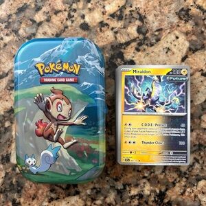 Pokemon Trading Card Game Tin with 25 Bulk Cards
